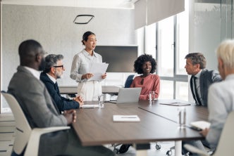 Diverse business professionals participating in a corporate meeting